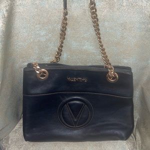 Black Valentino With Gold Accents